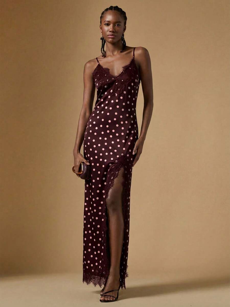 Women's black lace split satin long dress featuring spaghetti straps, asymmetrical slit hem, and matching arm sleeves.