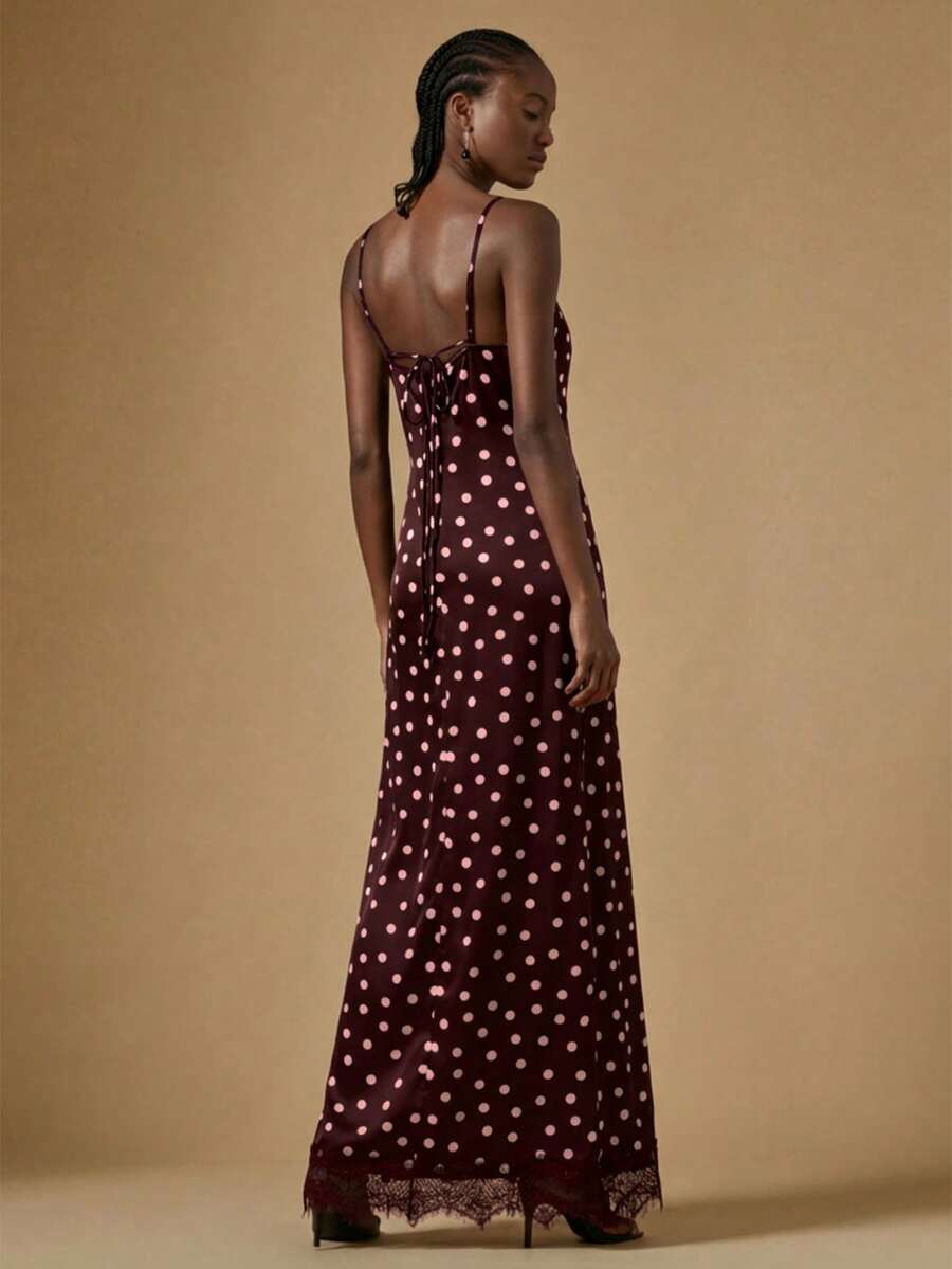Women's black lace split satin long dress featuring spaghetti straps, asymmetrical slit hem, and matching arm sleeves.