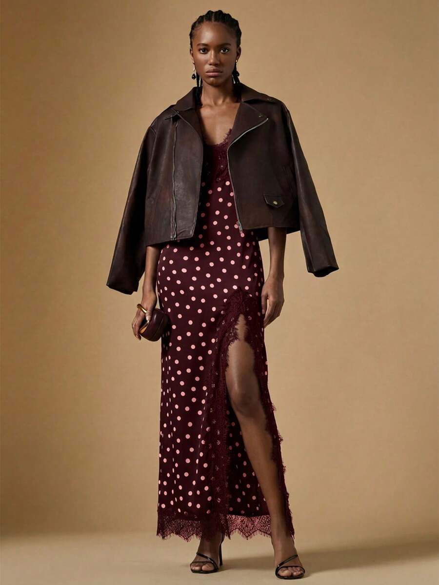 Women's black lace split satin long dress featuring spaghetti straps, asymmetrical slit hem, and matching arm sleeves.