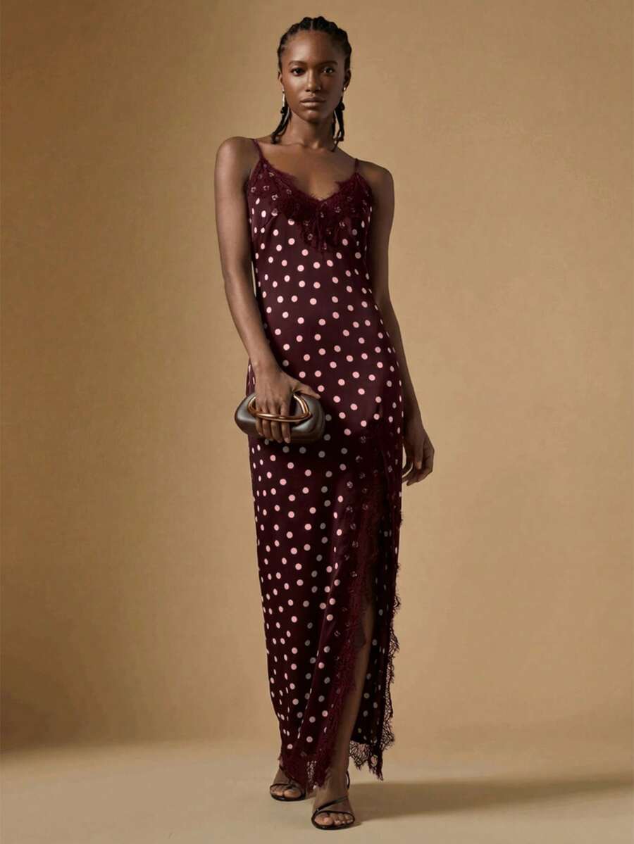 Women's black lace split satin long dress featuring spaghetti straps, asymmetrical slit hem, and matching arm sleeves.