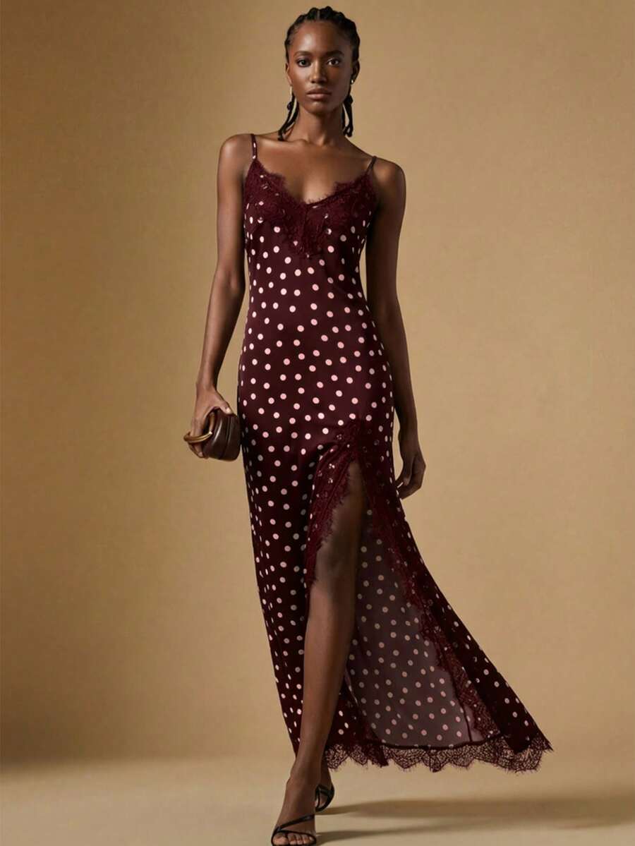 Women's black lace split satin long dress featuring spaghetti straps, asymmetrical slit hem, and matching arm sleeves.