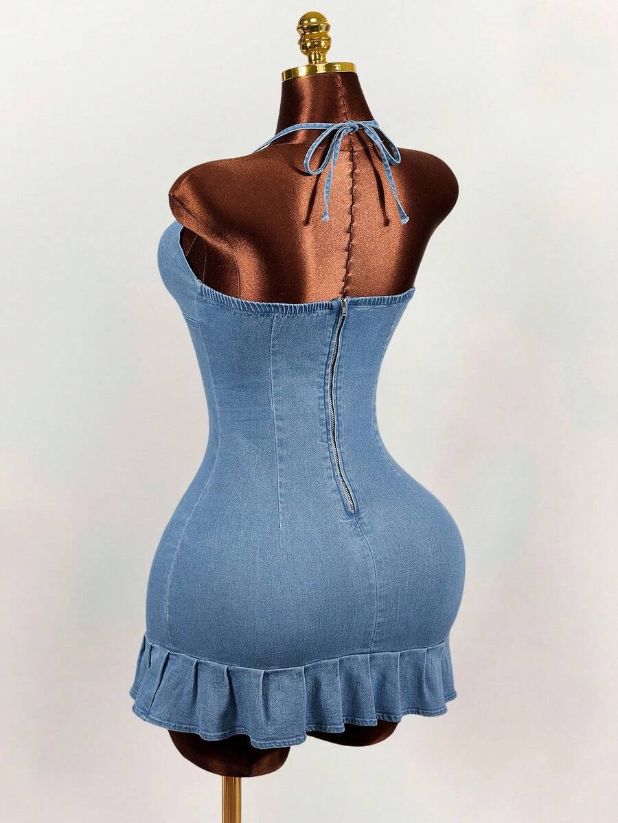 Women's blue denim halter mini dress featuring front cut-out details and a flounce ruffle hem.