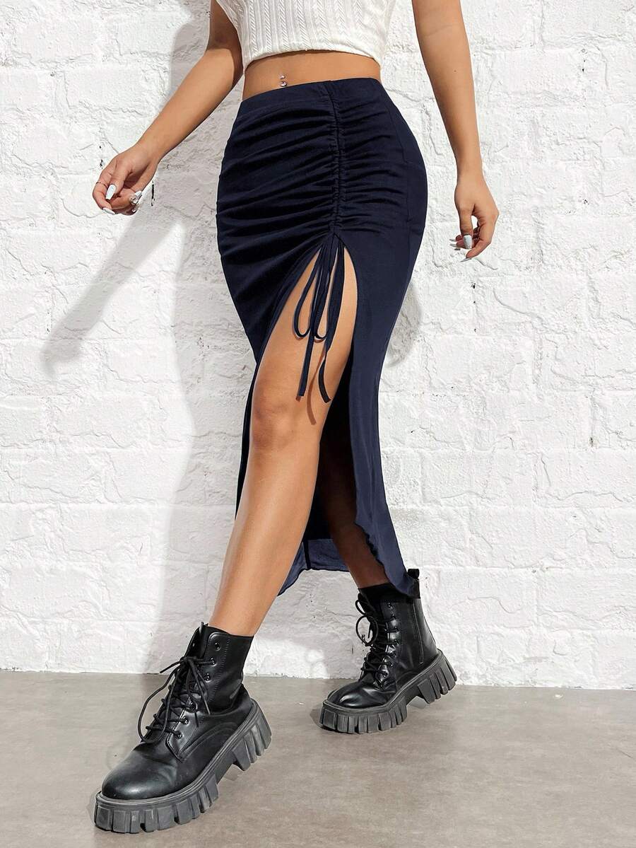 Women's black high-waisted bodycon long skirt featuring a drawstring split thigh detail and mesh fabric.