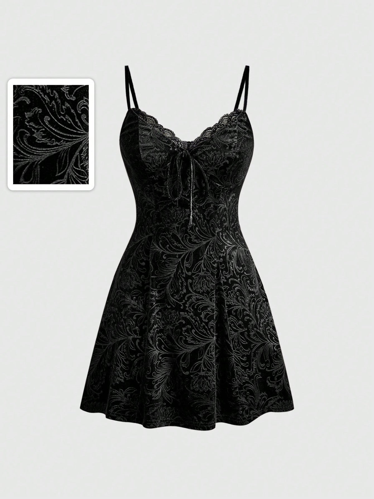 Women's black goth lace patchwork velvet mini slip dress with spaghetti straps, cup detail, high waist, and flared hem.