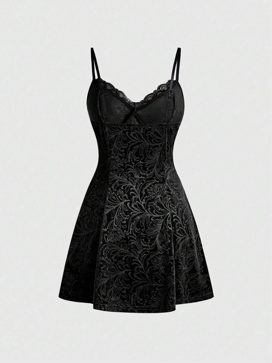 Women's black goth lace patchwork velvet mini slip dress with spaghetti straps, cup detail, high waist, and flared hem.