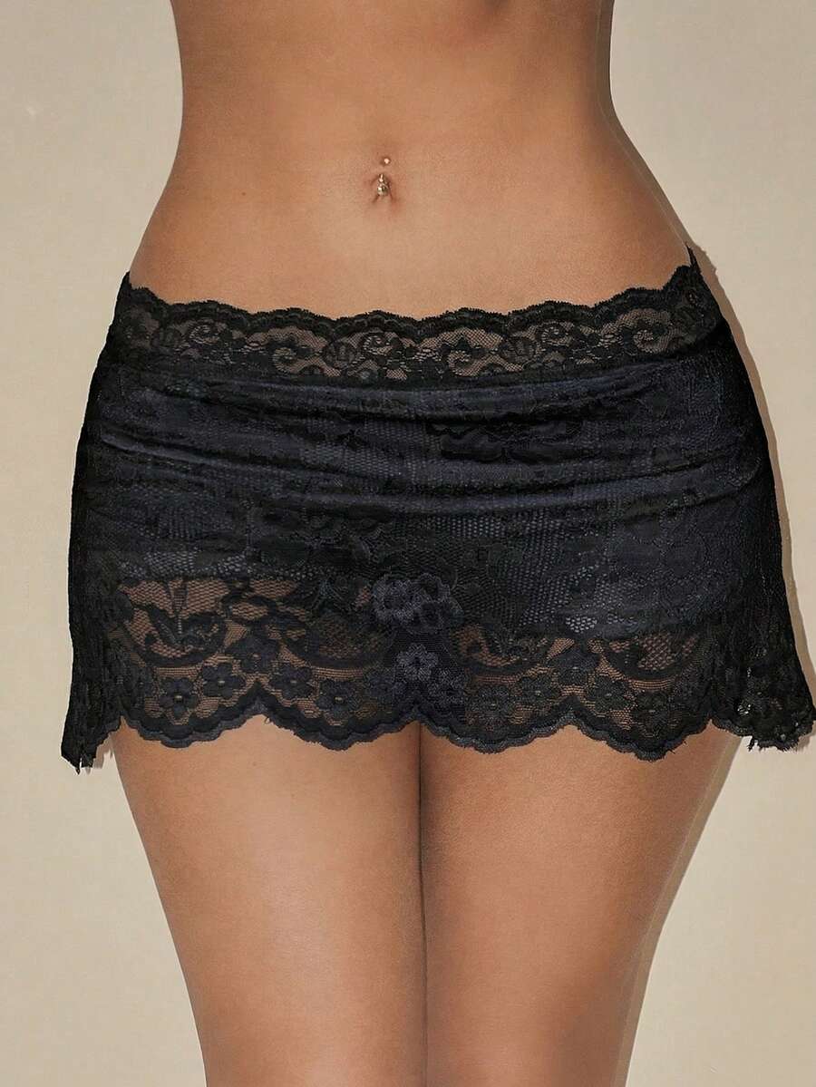 Black ultra low waist lace patchwork mini skirt for women with scallop contrast lace details and bodycon fit.