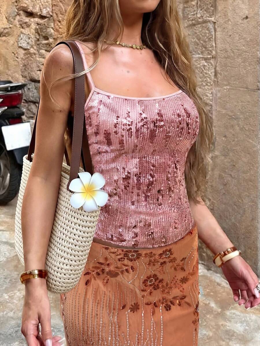 Women's burgundy glitter sequin cami tank top with thin spaghetti straps and a short length fit.
