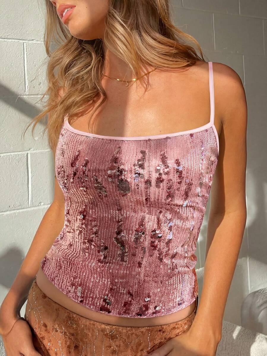 Women's burgundy glitter sequin cami tank top with thin spaghetti straps and a short length fit.