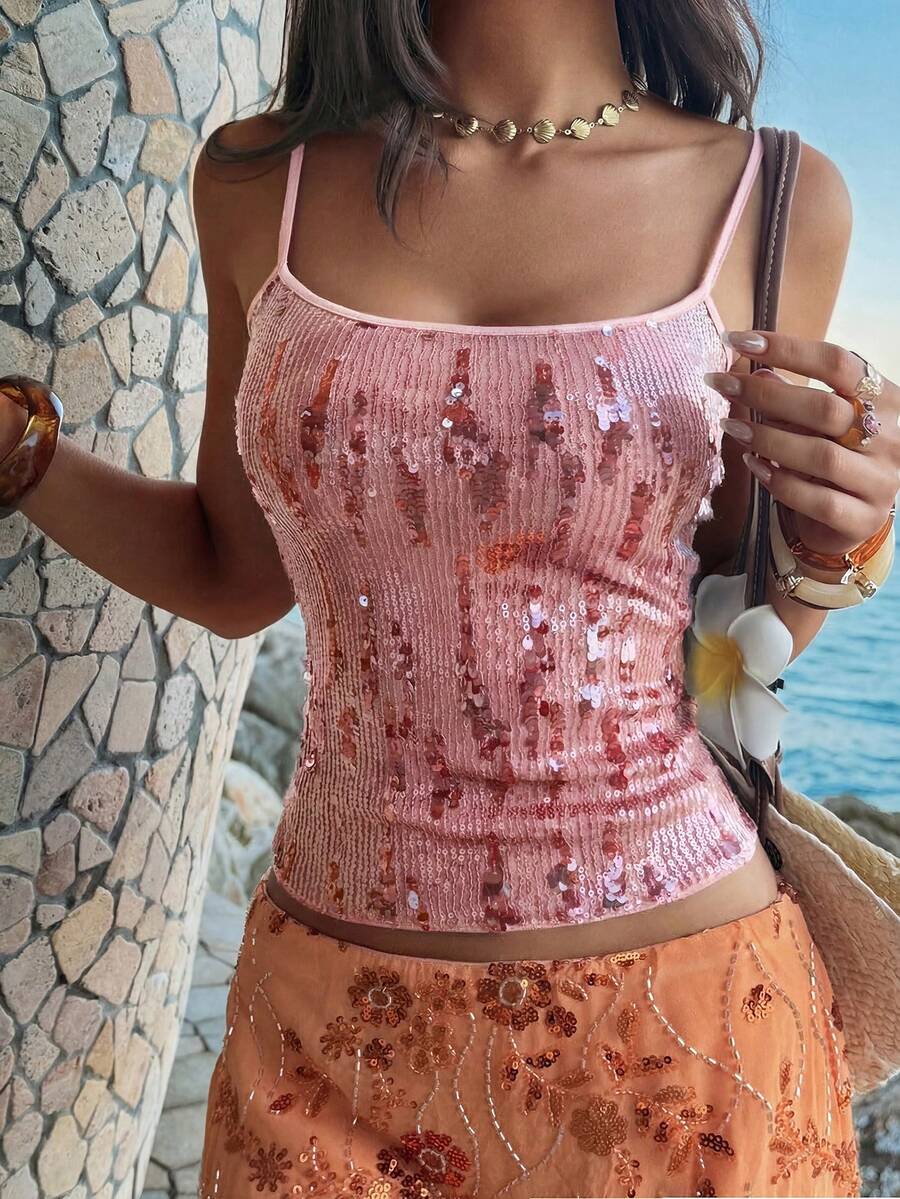 Women's burgundy glitter sequin cami tank top with thin spaghetti straps and a short length fit.