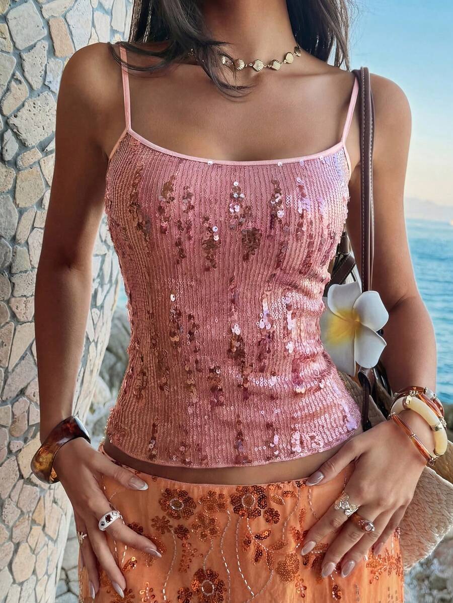 Women's burgundy glitter sequin cami tank top with thin spaghetti straps and a short length fit.