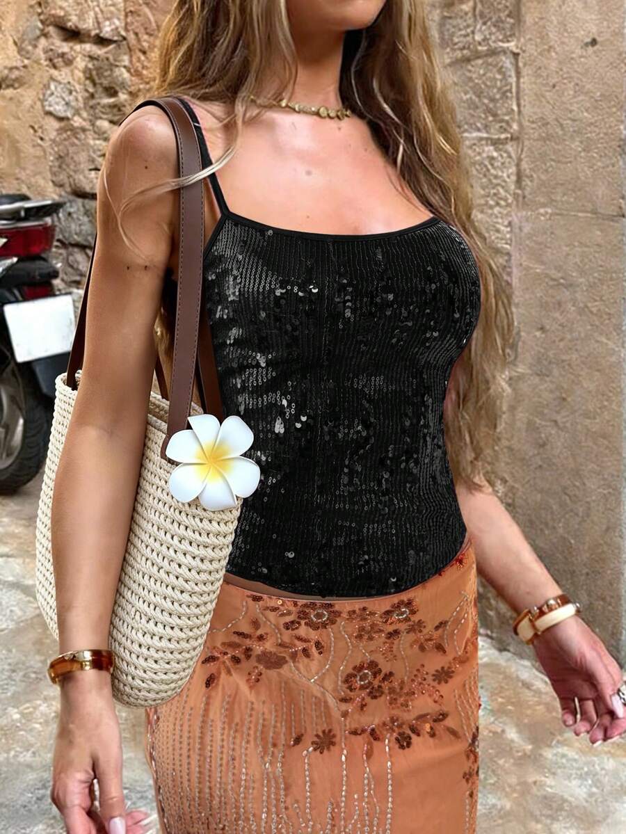 Women's burgundy glitter sequin cami tank top with thin spaghetti straps and a short length fit.
