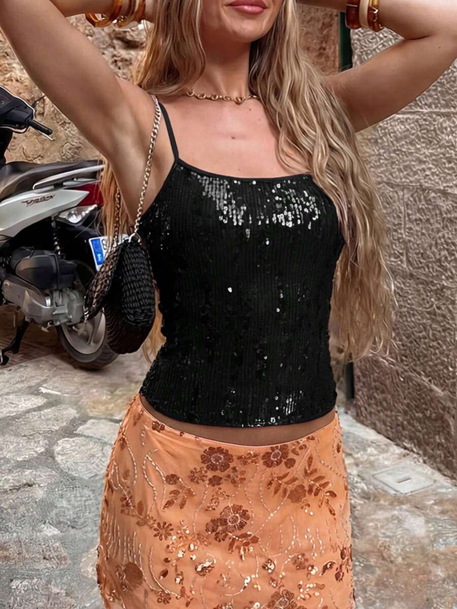 Women's burgundy glitter sequin cami tank top with thin spaghetti straps and a short length fit.