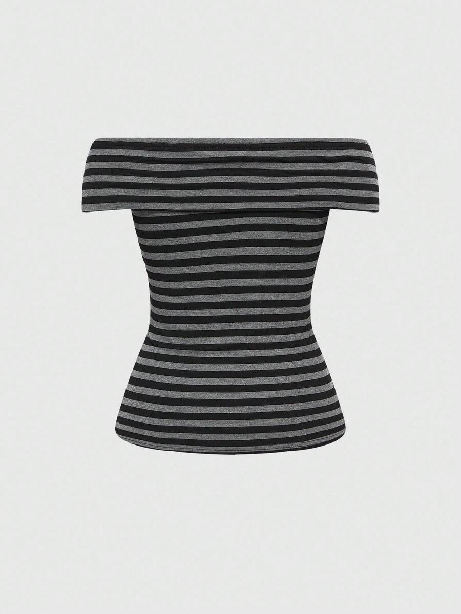 Multicolor striped two-piece outfit featuring a short-sleeve cross off-shoulder top with rivet accents and low-waist mini shorts.
