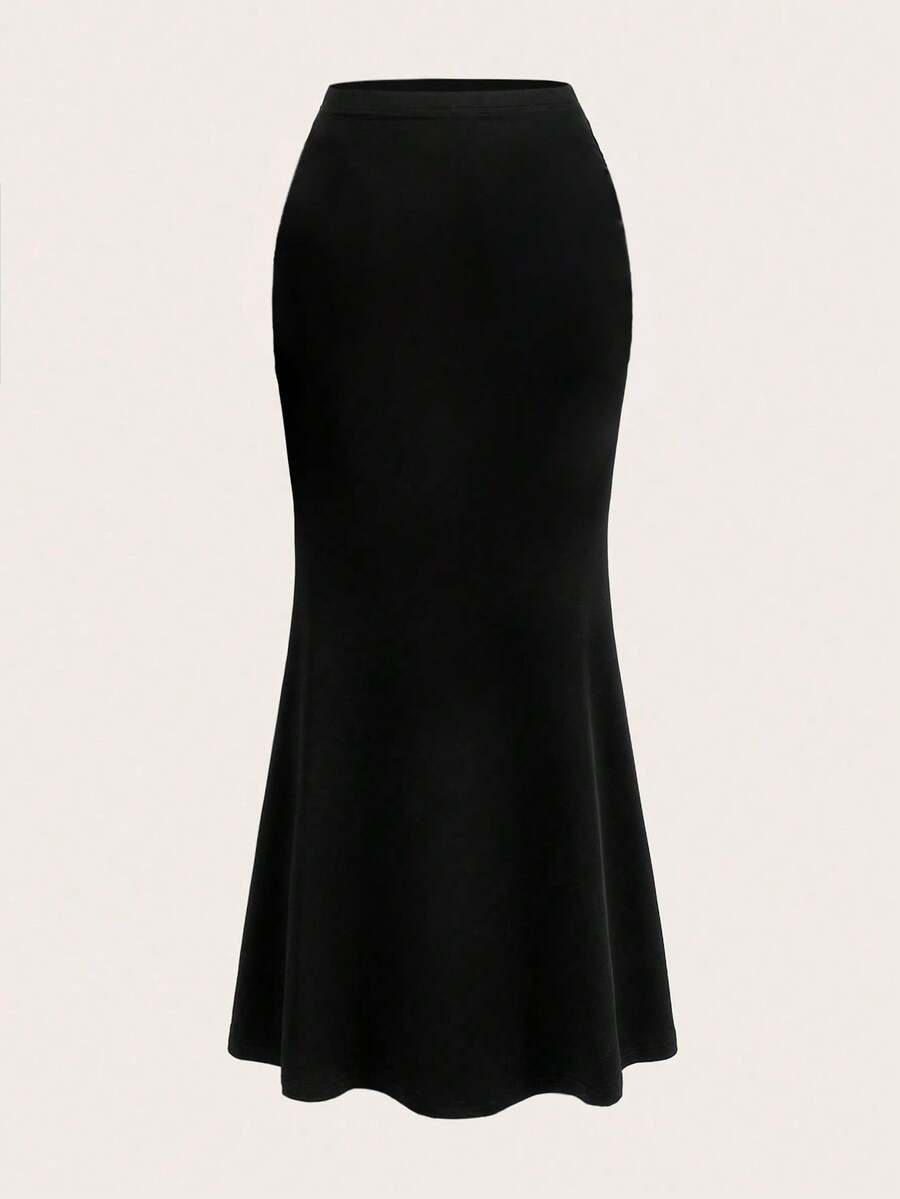 Women's black floral embroidered mermaid maxi skirt featuring high stretch fabric, skinny fit, and floor-length evening design.