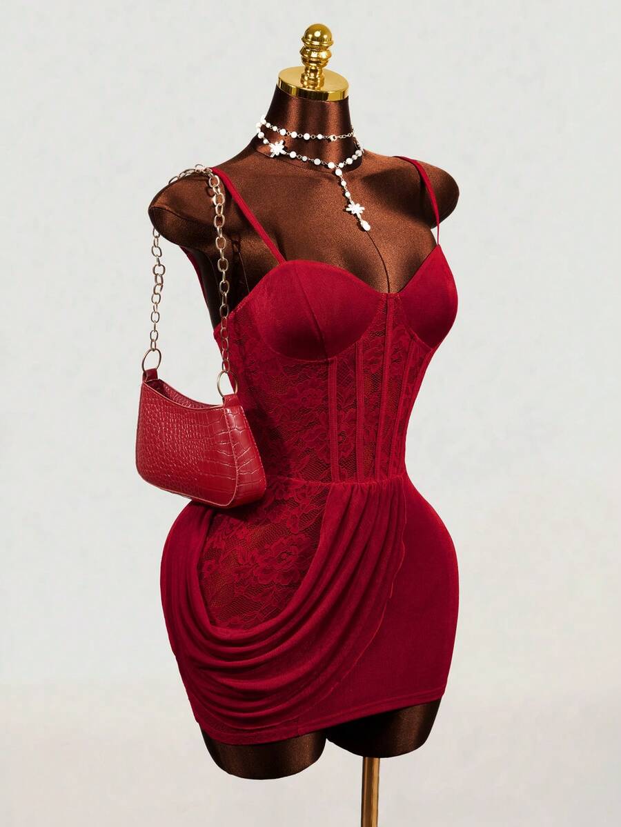 Red sleeveless cami mini dress with spaghetti straps, boned structure, and a slim fit pencil hem.