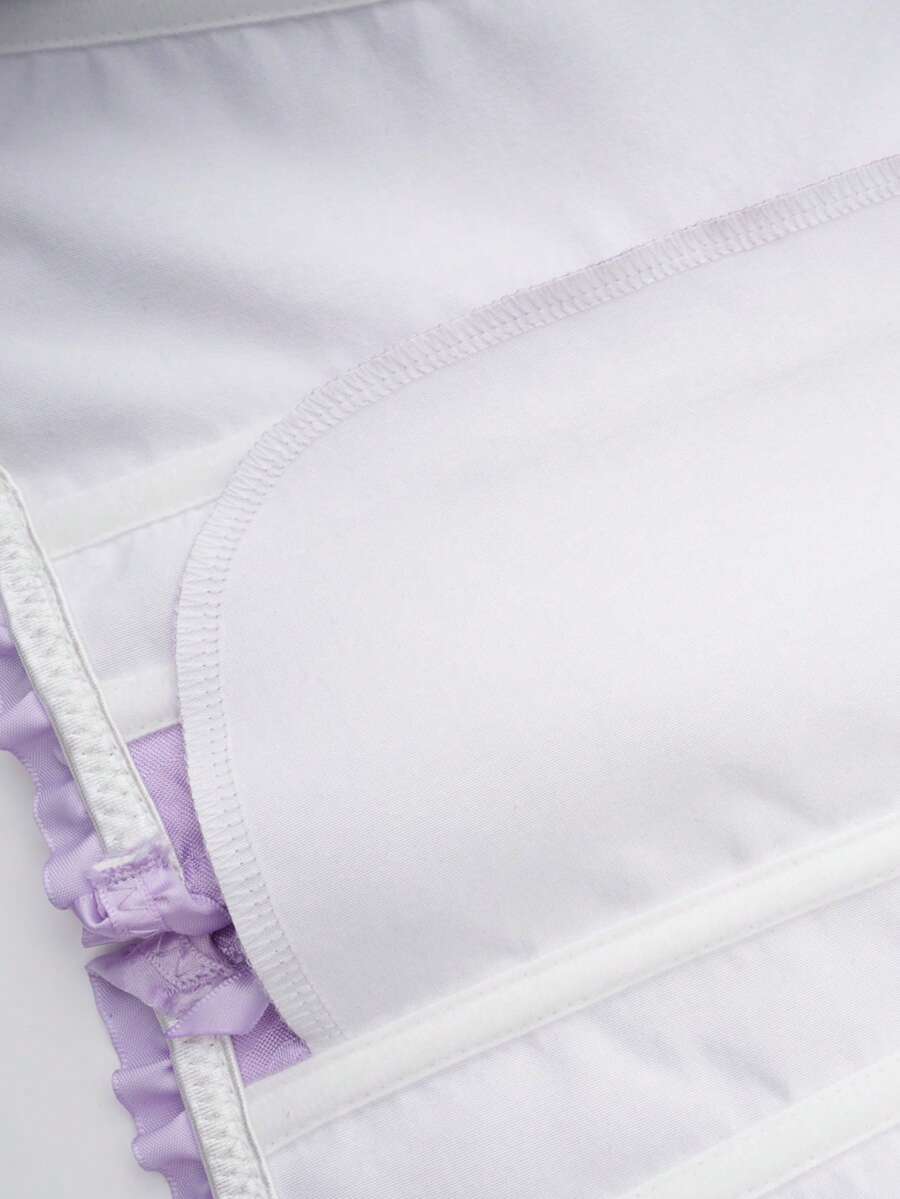 Women's strapless backless shapewear corset camisole top with floral lace, lace-up front, and grommet eyelet details.