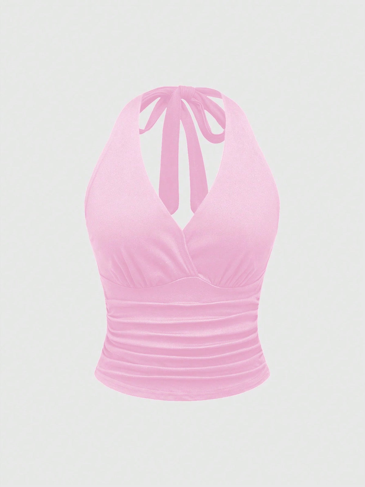 Women's halter crop tank top featuring a backless silhouette and ruched detailing in a slim fit design.