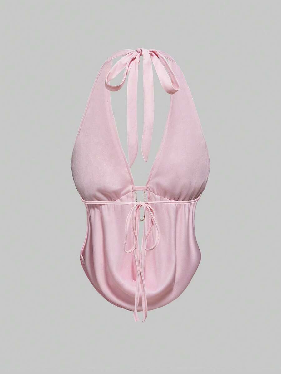 Pink sequin halter tank top for women featuring embroidered draped backless design and asymmetrical hem.