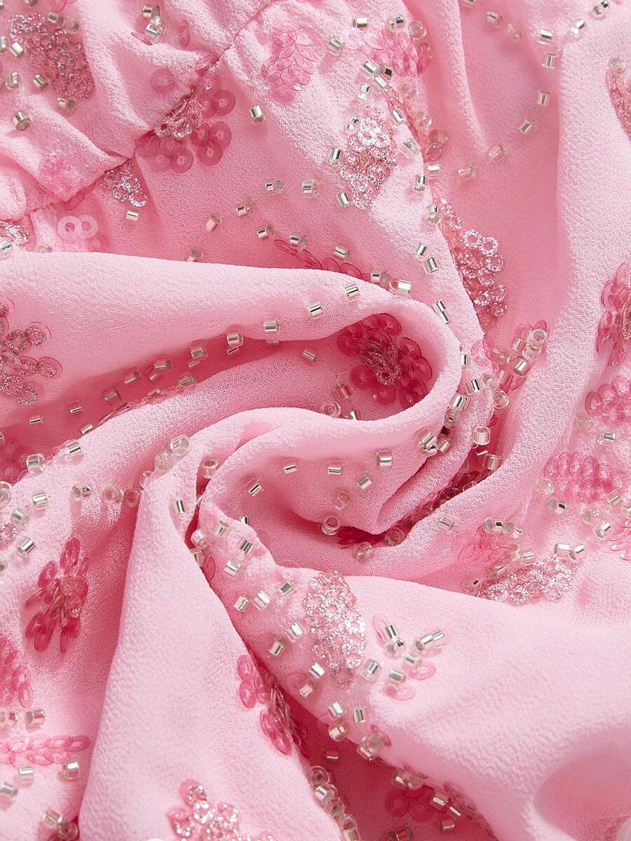 Pink sequin halter tank top for women featuring embroidered draped backless design and asymmetrical hem.