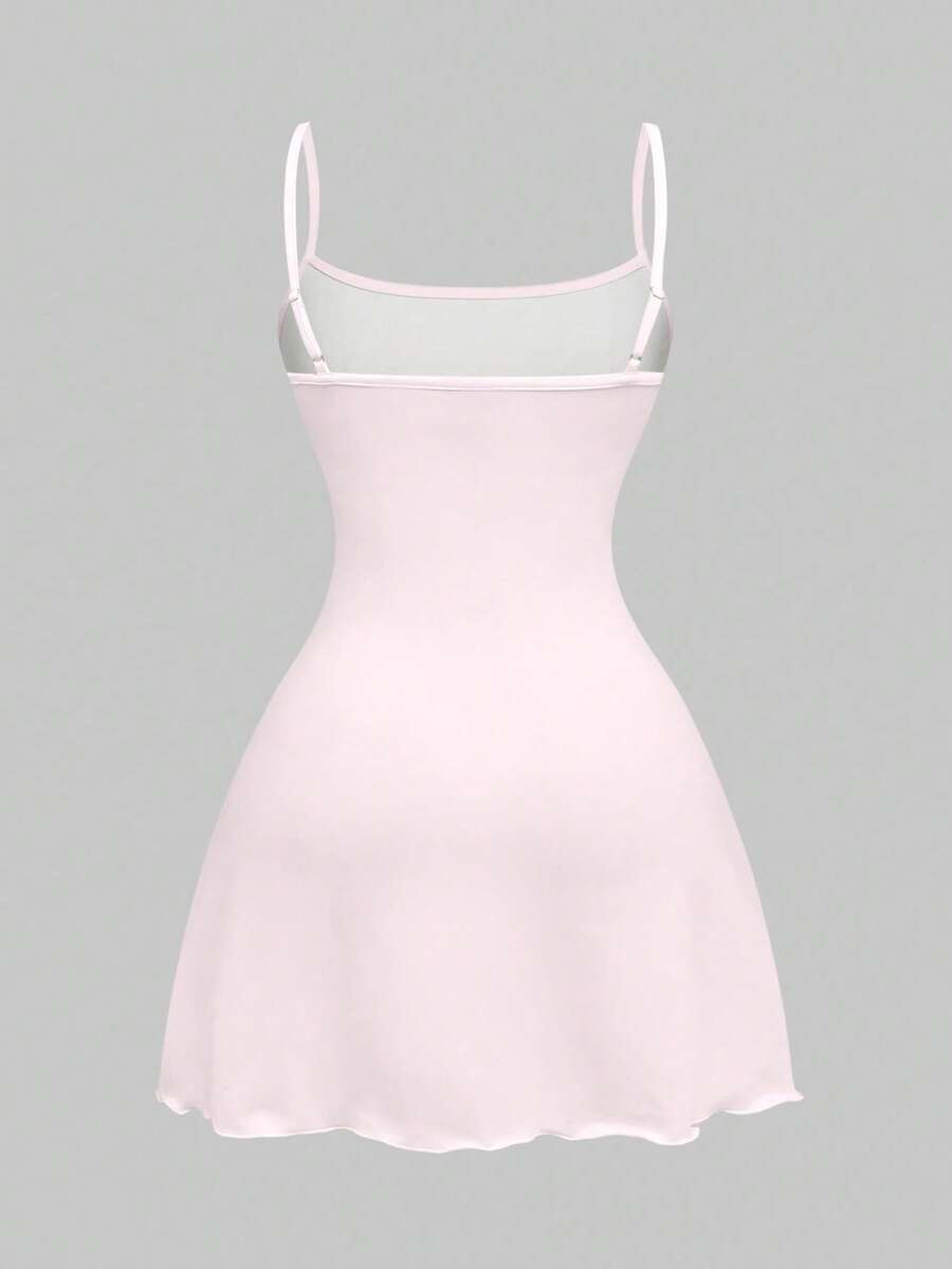 Women's black backless cami mini dress featuring spaghetti straps, lettuce trim detail, high waist, and a flared hem design.