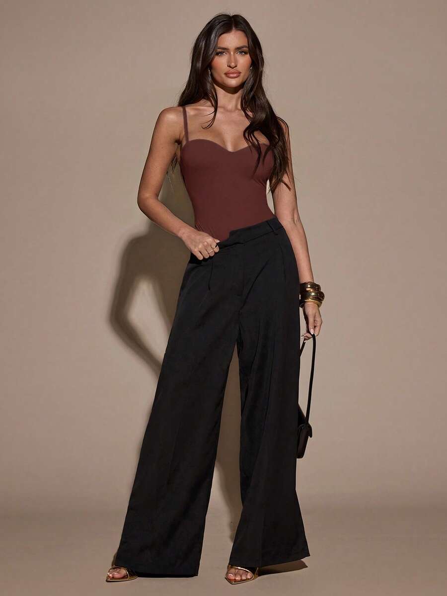 Apricot women's lace sheer camisole top featuring spaghetti straps, contrast lace trim, backless slim fit design, and knitted stretch fabric.