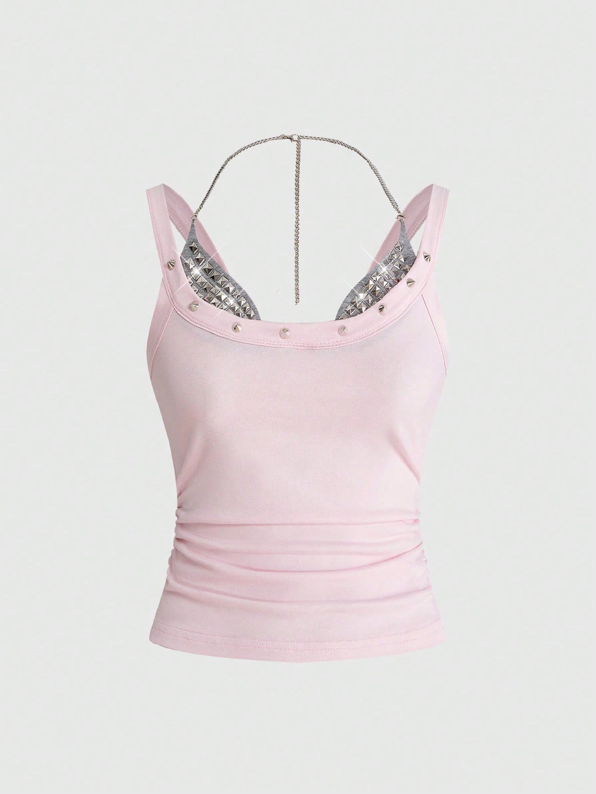 Backless grommet cami tank top featuring slim fit silhouette and strap details on knitted fabric