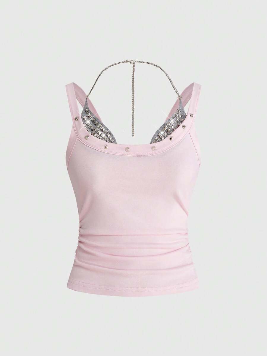 Backless grommet cami tank top featuring slim fit silhouette and strap details on knitted fabric