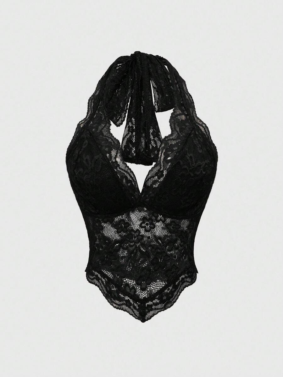 Women's black lace halter neck camisole featuring a backless crop silhouette, contrast lace trim, and scallop hem.