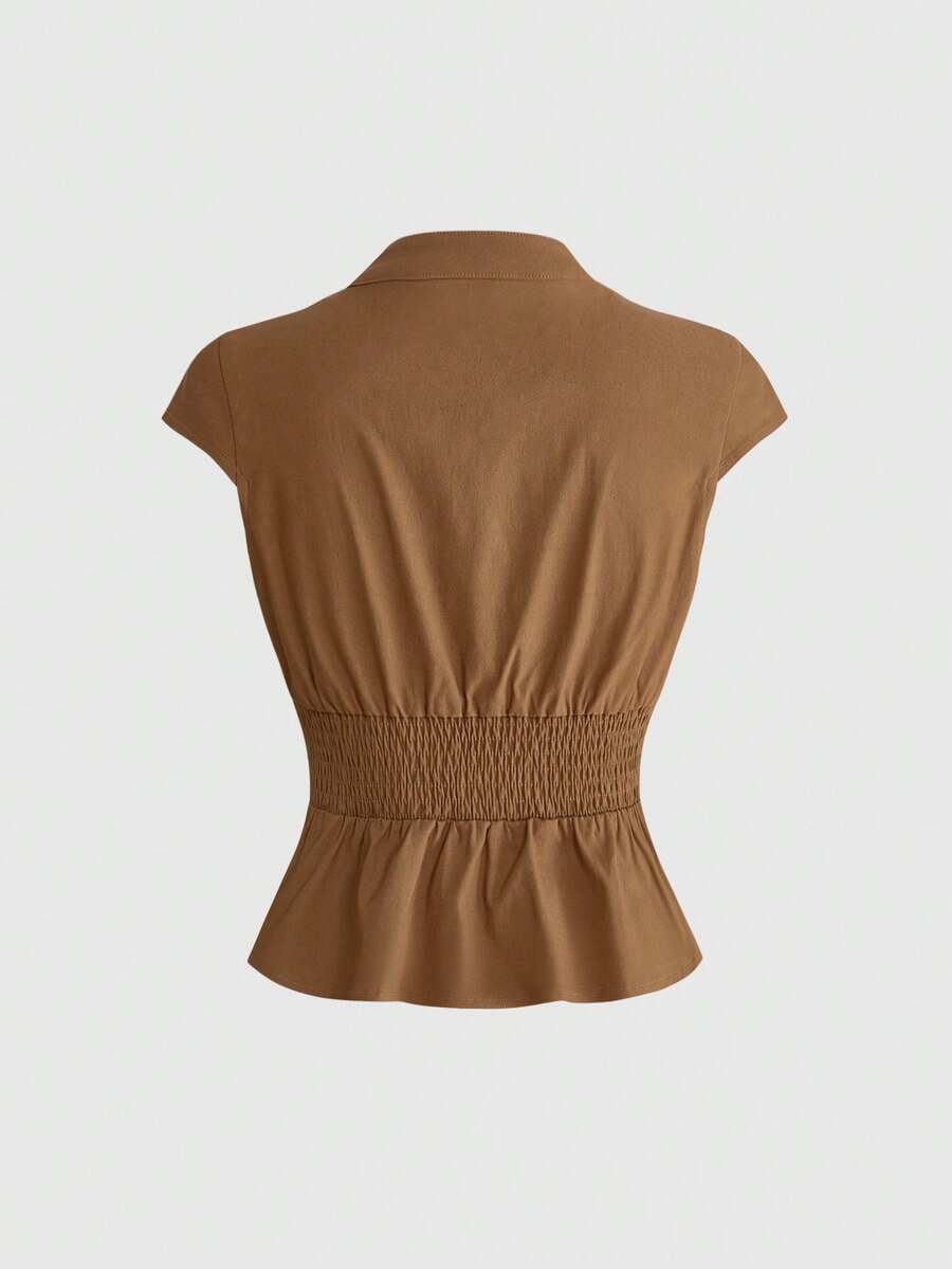 Women's black deep V-neck top featuring cap sleeves, cut-out lace-up details, zipper closure, and regular fit woven fabric.