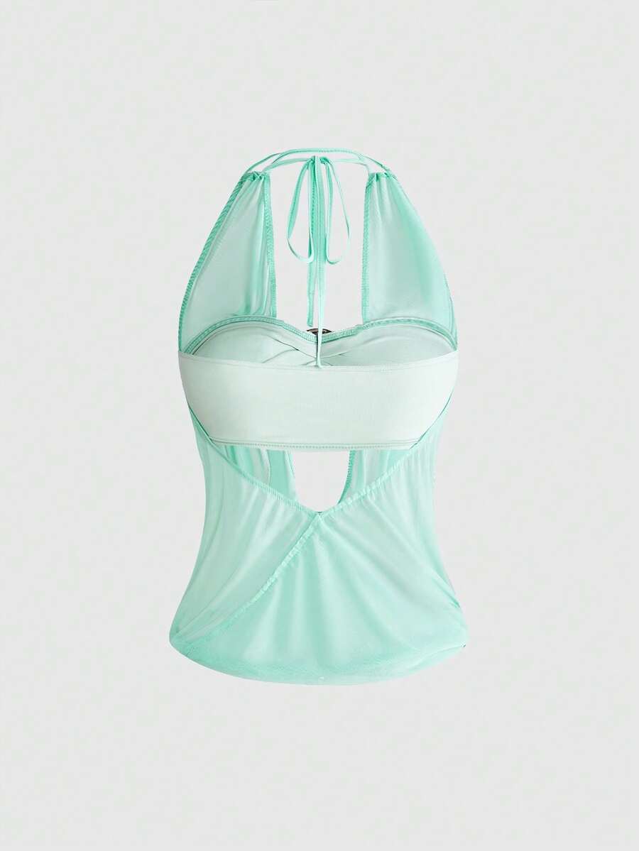 Women's cowl neck halter crop tank top featuring a draped backless design and matching bandeau inner layer.