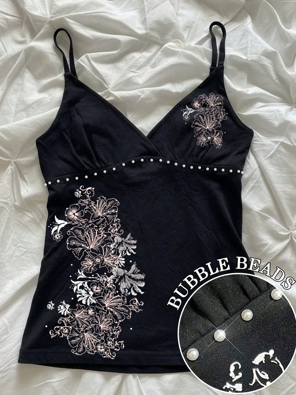 Women's slim fit spaghetti strap cami top featuring a tropical hibiscus floral graphic print.