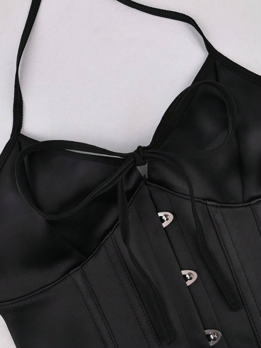 Black satin corset camisole crop top for women with halter neckline, front hook closure, back lace-up detail, and boned waist shaping.
