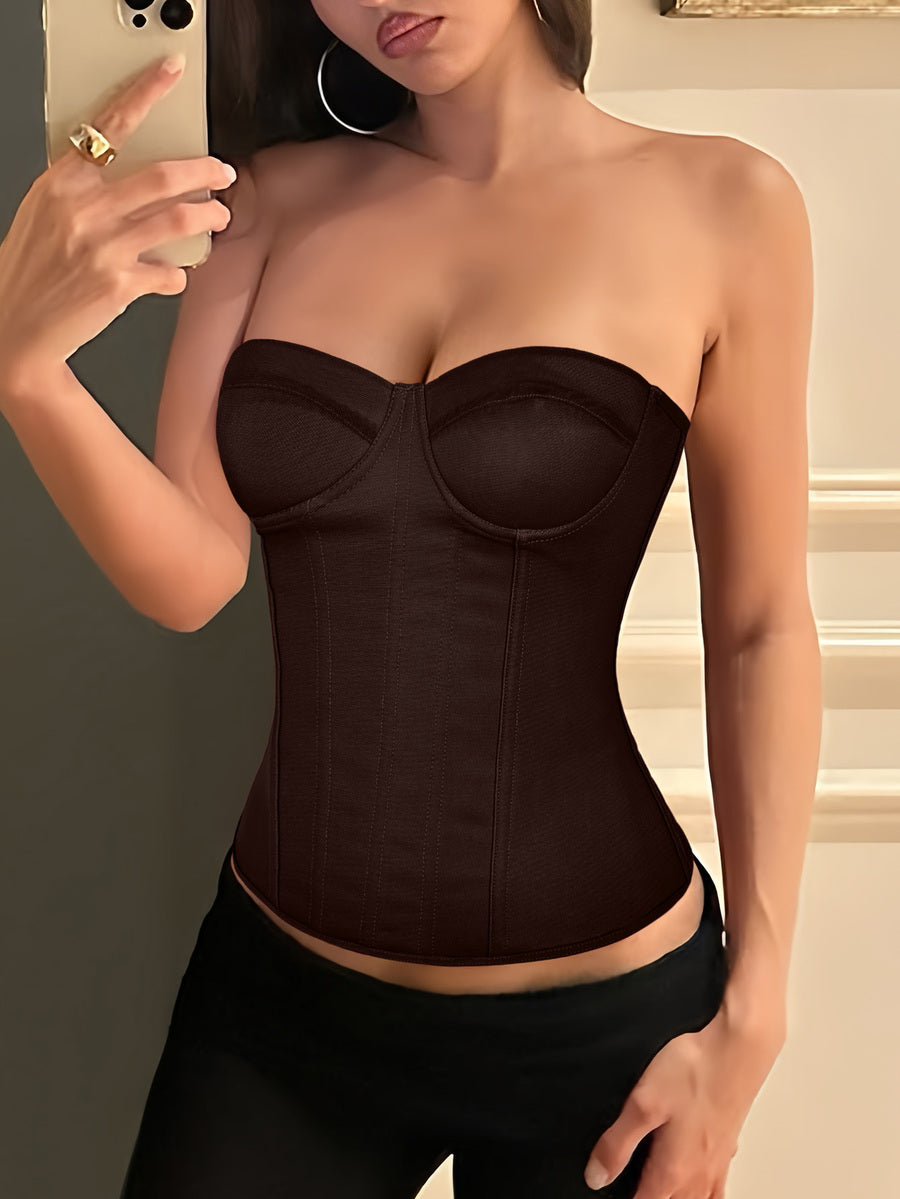 Black strapless corset top with boning, lace-up back, and a cropped slim-fit silhouette for women.