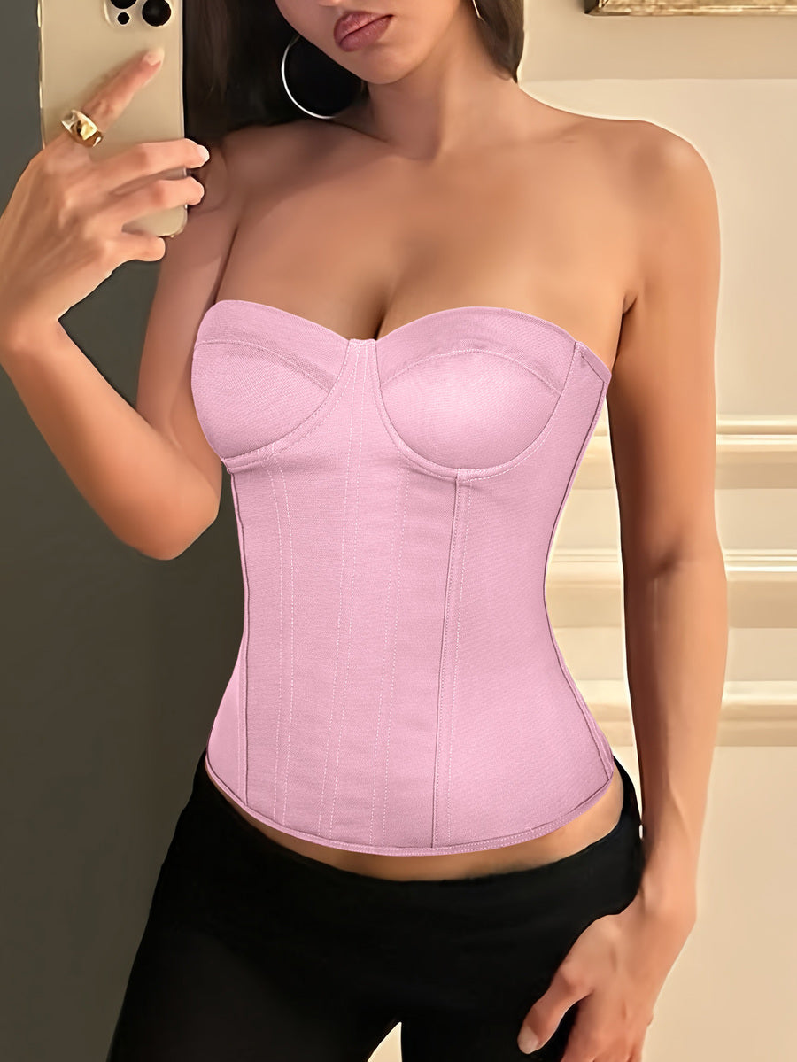 Black strapless corset top with boning, lace-up back, and a cropped slim-fit silhouette for women.