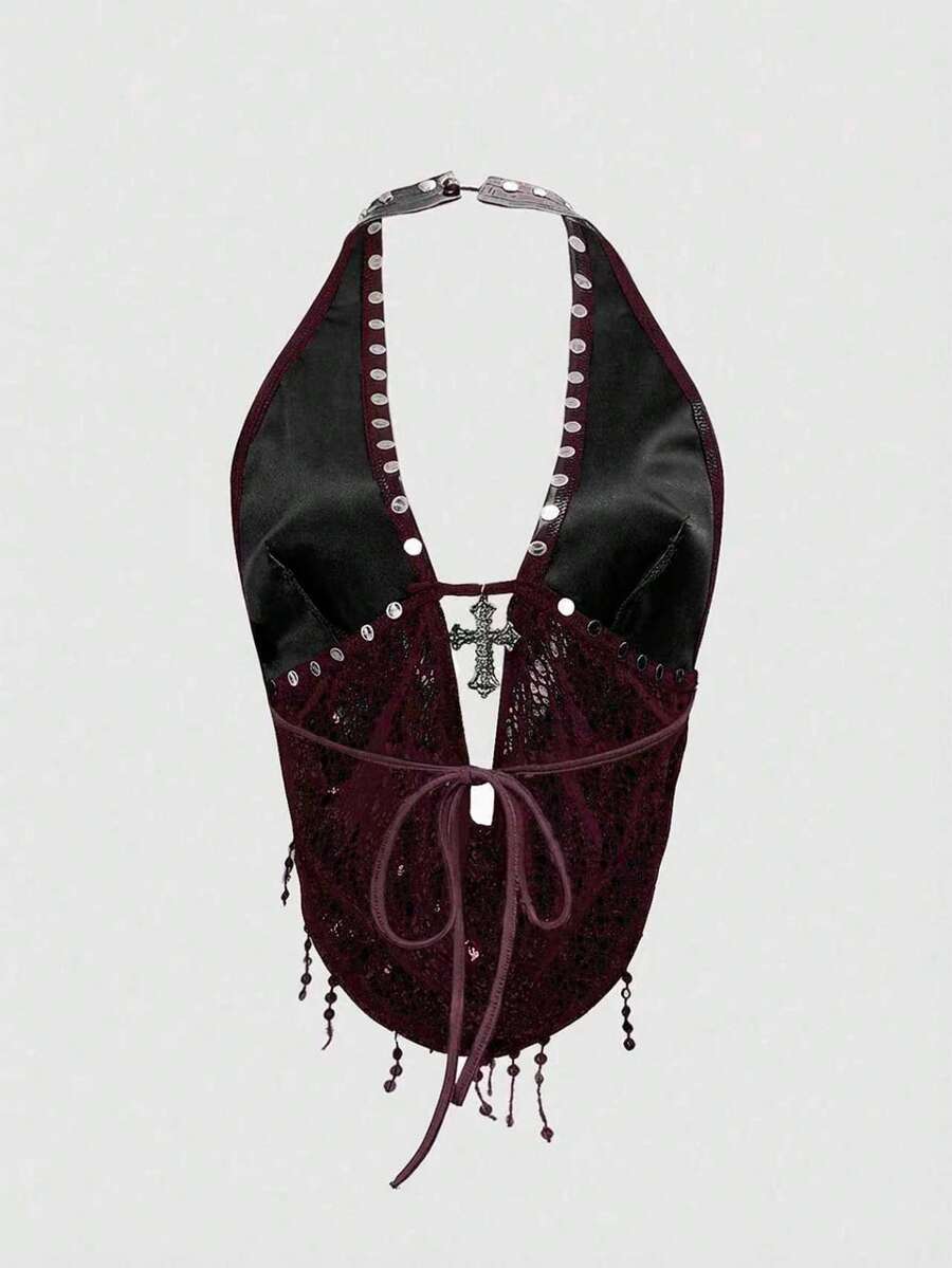 Black sequin backless halter top featuring an asymmetrical hemline and slim fit design for women.
