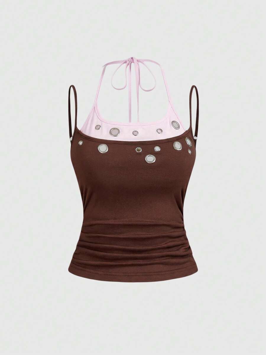 Black halter crop tank top for women featuring lace up front details, ruched accents, and appliques in a slim fit knitted fabric.