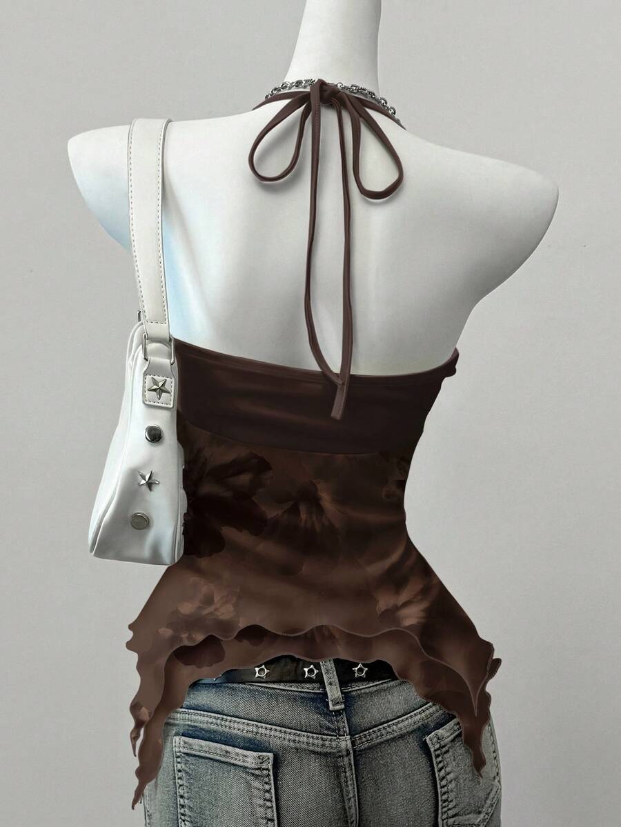 Women's backless halter cami top featuring a paisley print, sleeveless design, and an asymmetrical hem in knitted fabric.