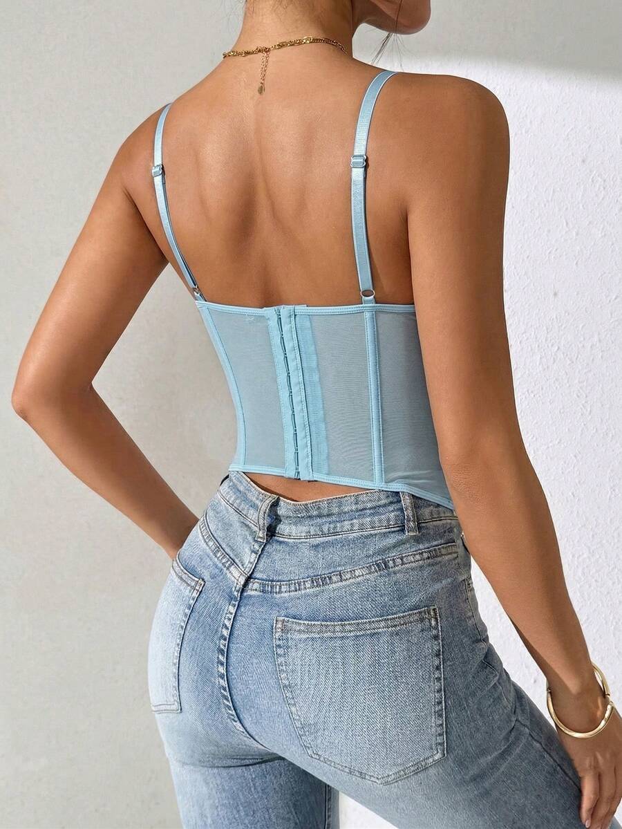 Women's brown lace trim cami corset crop top featuring a low cut neck, unlined body, and slim fit bodycon silhouette.