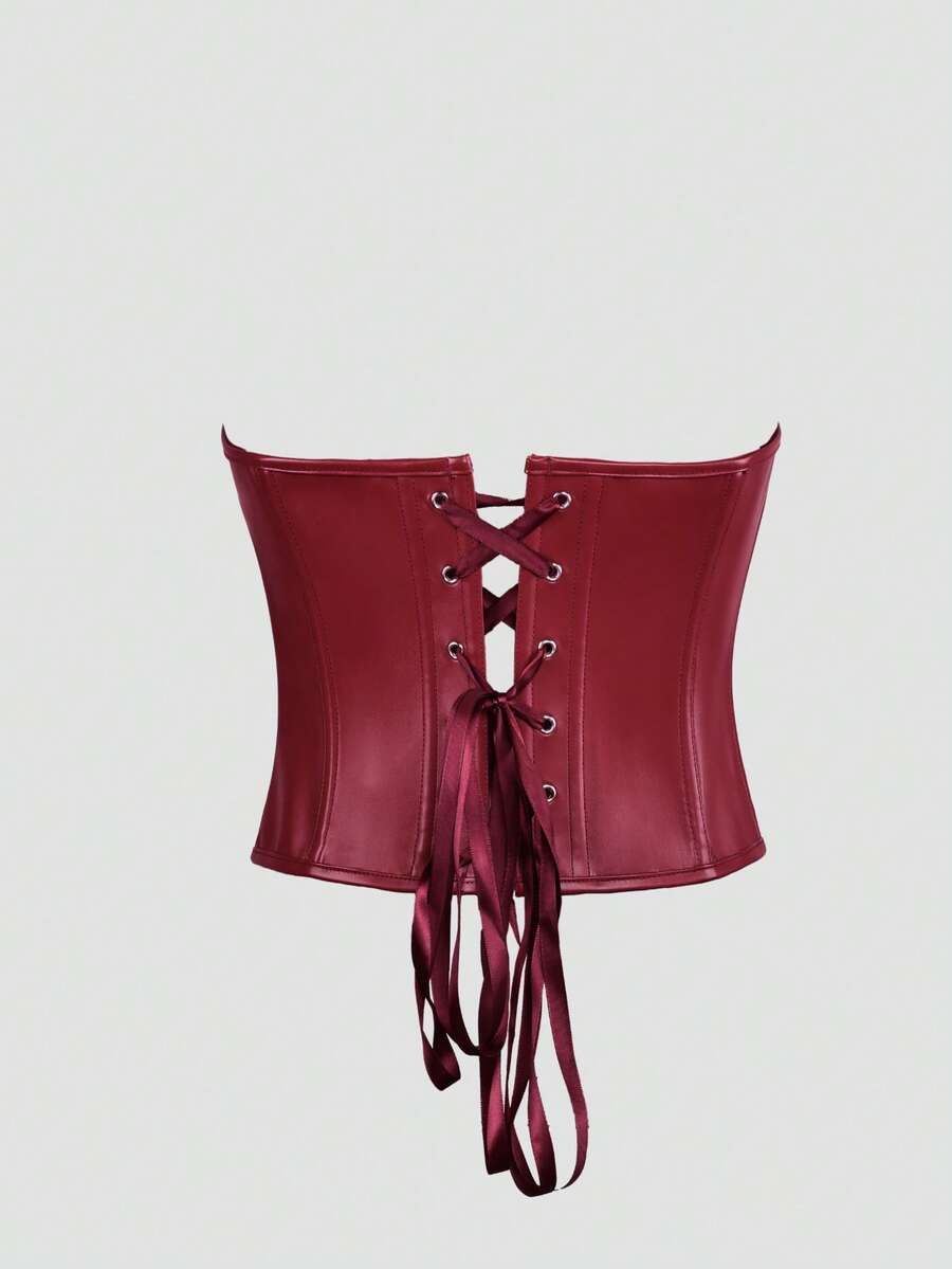 Black Y2K fitted corset crop top featuring a halter neckline, backless design, front hook closure, and back lace-up detail.