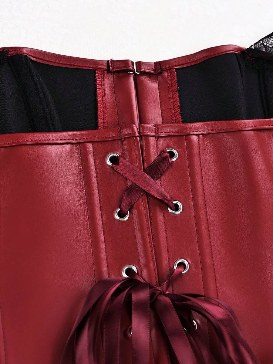Black Y2K fitted corset crop top featuring a halter neckline, backless design, front hook closure, and back lace-up detail.
