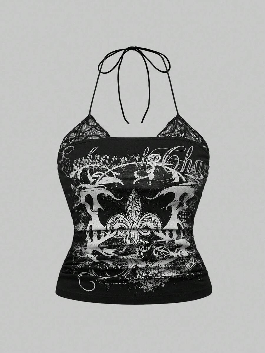 Multicolor graphic crop halter top with contrast lace trim and knot detail in a slim fit stretch knit fabric.