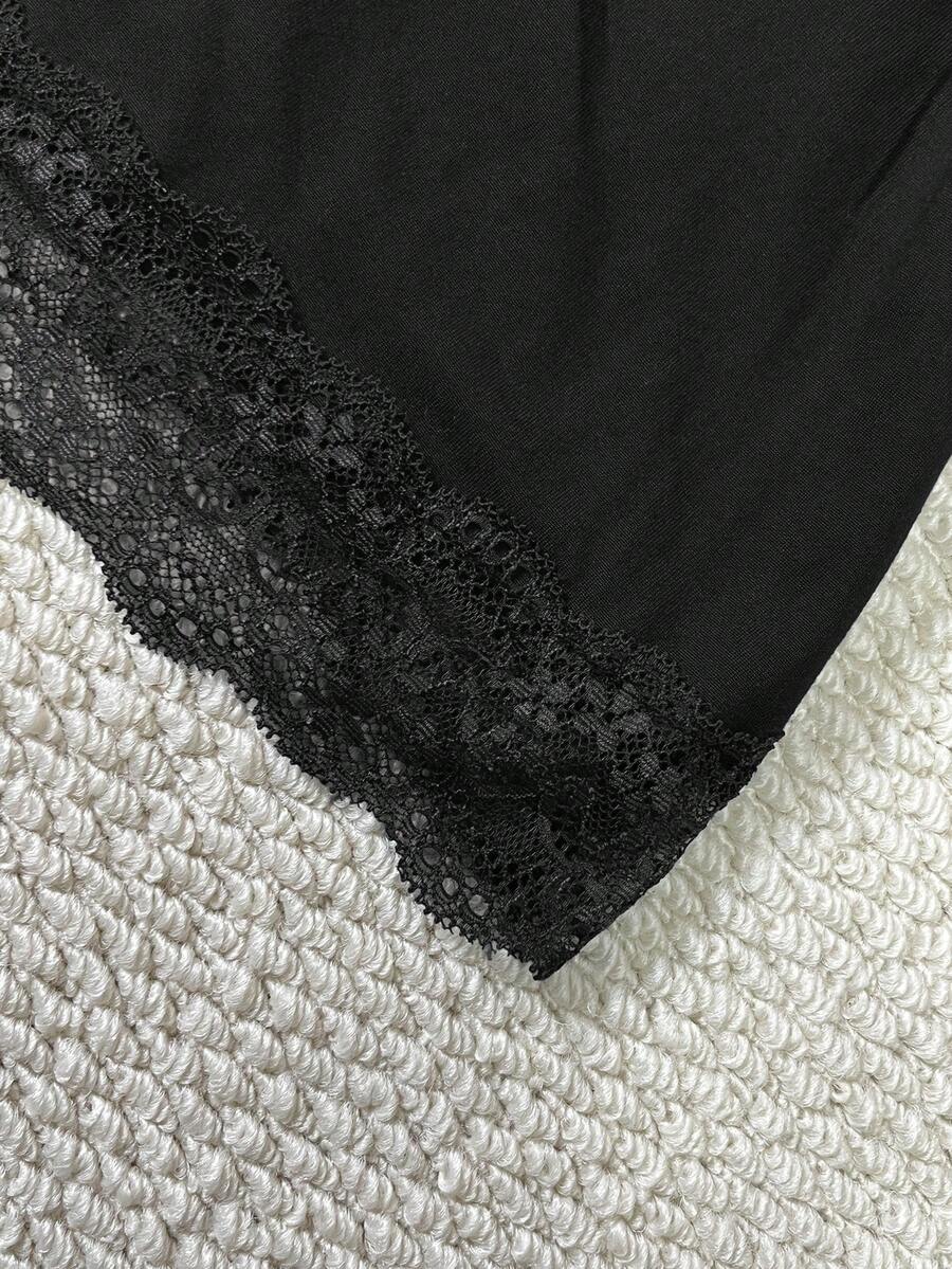 Women's solid color slim fit camisole top featuring delicate lace patchwork embroidery and tank straps.
