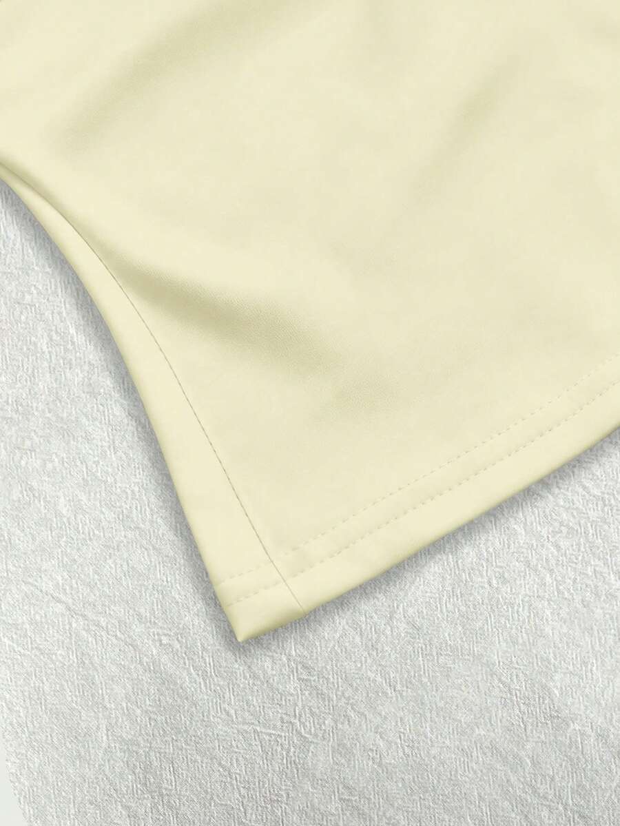 A women's solid slim fit camisole top with delicate contrast lace trim around the neckline and spaghetti straps.