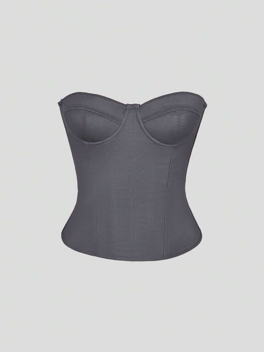Red strapless corset top with boning and lace-up back, slim fit cropped tube top for women.