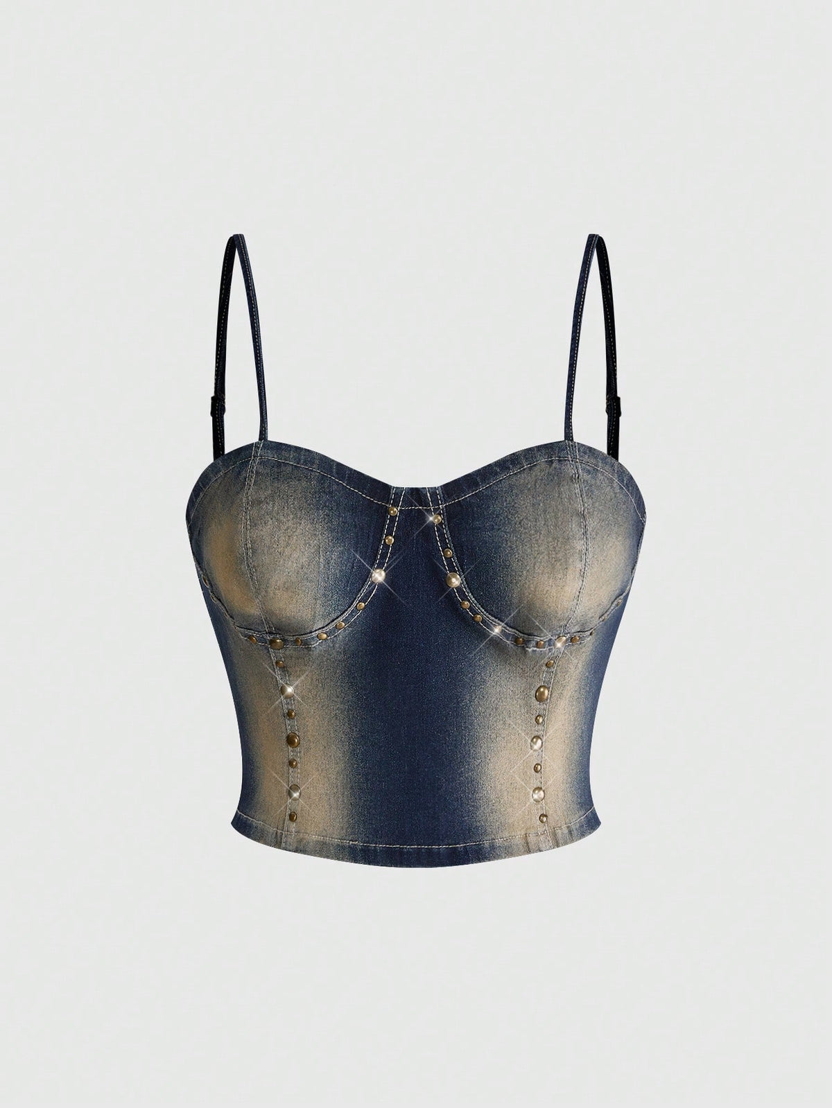 Women's medium wash denim camisole crop top featuring spaghetti straps, cup detailing, and rivet accents.