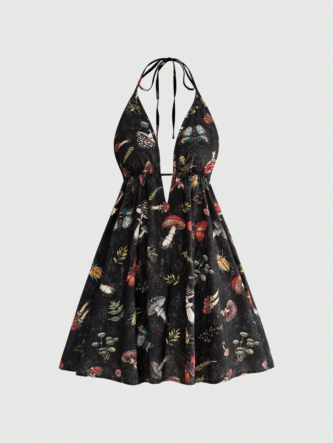Black fairycore halter backless mini dress with mushroom, moth, and plant print featuring a high waist and flared hem.