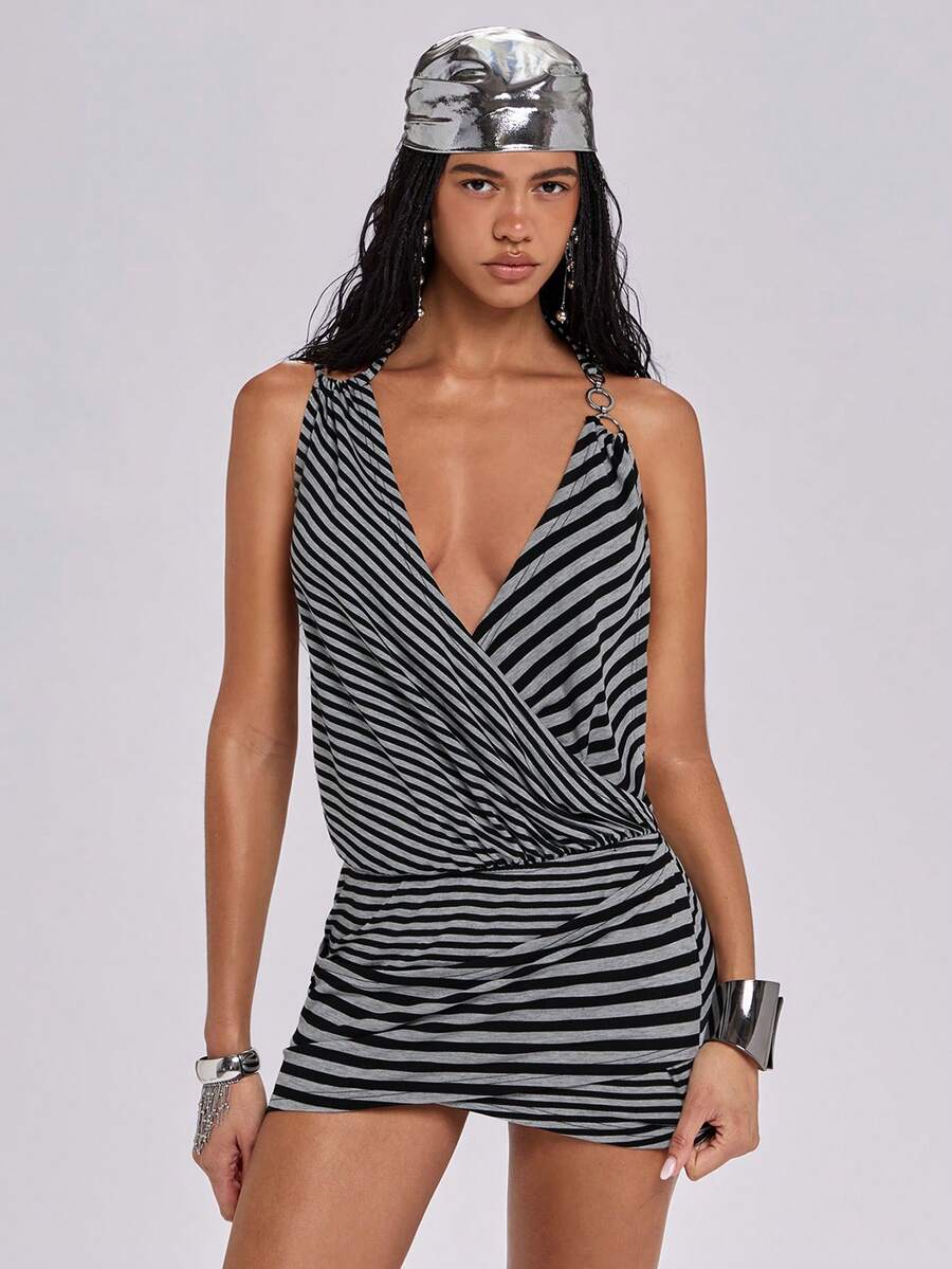Women's striped halter bodycon mini dress featuring a sleeveless Y2K cami style in knitted high-stretch fabric with ring details.