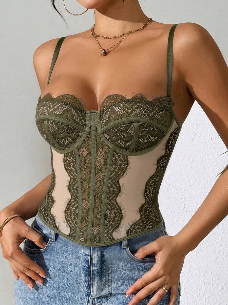 Women's brown lace trim cami corset crop top featuring a low cut neck, unlined body, and slim fit bodycon silhouette.