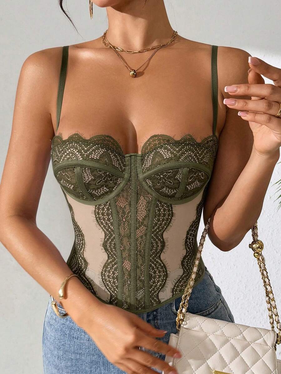 Women's brown lace trim cami corset crop top featuring a low cut neck, unlined body, and slim fit bodycon silhouette.