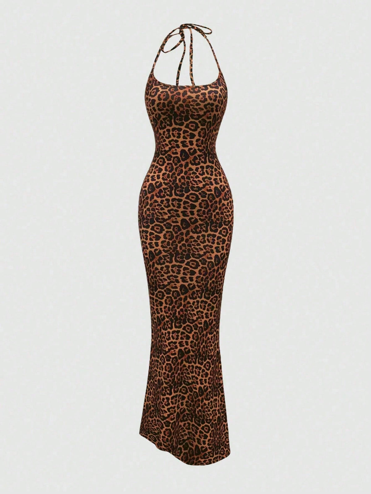 Women wearing a sleeveless leopard print halter neck maxi bodycon dress with a side slit